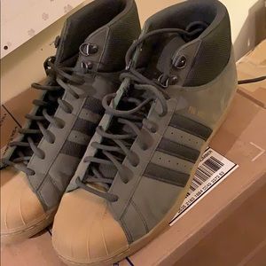 Green Adidas pro model sneakers